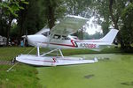 N300BS @ KOSH - At Lake Winnebago - by Terry Fletcher