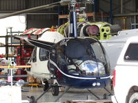 ZK-IMI @ NZAR - in heliflite hangar - by magnaman