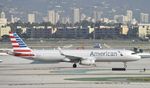 N125AA @ KLAX - Taxiing to gate at LAX - by Todd Royer