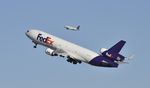 N576FE @ KLAX - Departing LAX - by Todd Royer