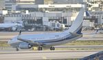 N836BA @ KLAX - Taxiing for departure - by Todd Royer