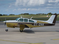 OY-DNK @ EGJB - On the West Parking, Guernsey - by alanh