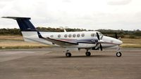 M-WATJ @ EGFH - Visiting Beech 250. - by Roger Winser