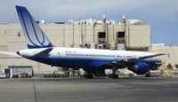 N527UA @ KSFO - SFO 2013. - by Clayton Eddy