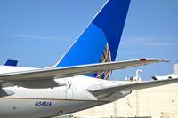 N541UA @ KSFO - SFO 2013. - by Clayton Eddy