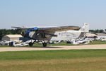 N8407 @ OSH - 1929 Ford 4-AT-E, c/n: 69, back flying after a wing spar repair found just before the start of AirVenture. - by Timothy Aanerud