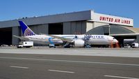N38950 @ KSFO - Getting a bath. SFO. 2017. - by Clayton Eddy