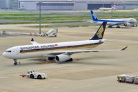 9V-STG @ RJTT - Now with TAP-Portugal, CS-TOW - by JPC