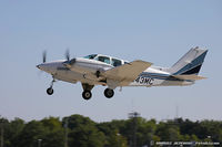 N43MC @ KOSH - Beech A56TC Baron  C/N TG-85, N43MC - by Dariusz Jezewski www.FotoDj.com