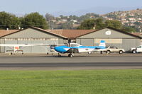 N8667H @ SZP - 1947 North American NAVION, Continental IO-520 285 Hp upgrade, taxi to Rwy 04 for warmup flight prior to giving Young Eagles flights today - by Doug Robertson