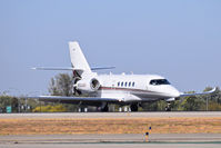 N524QS @ KBOI - Using reverse thrusters during landing roll out on RWY 10R. - by Gerald Howard