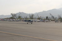 N704UT @ SZP - 1976 Cessna 150M, Continental O-200 100 Hp, landing roll Rwy 22 - by Doug Robertson
