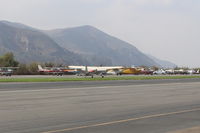 N2999A @ SZP - 1953 Cessna 180, Continental O-470-A 225 Hp, landing roll Rwy 22L grass - by Doug Robertson
