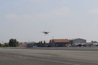 N2999A @ SZP - 1953 Cessna 180, Continental O-470-A 225 Hp, on final for STOL landing Rwy 22L grass - by Doug Robertson