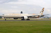 A6-ETB @ EGCC - Etihad B773 starting its take-off run. - by FerryPNL