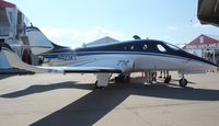 N403KT @ KOSH - Stratos 714 - by Mark Pasqualino