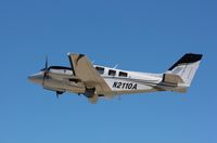 N2110A @ KOSH - Beech 58P