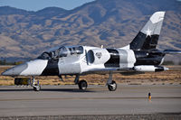 N136EM @ KBOI - Taxiing on Foxtrot.  Black Diamond Jet Team. - by Gerald Howard