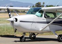 N61637 @ KRHV - Locally-based 1975 Cessna 172M taxing back to the flight school at Reid Hillview Airport, San Jose, CA. - by Chris Leipelt
