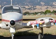 N711CT @ E16 - Locally-based 1973 Cessna 310Q parked on the ramp at San Martin Airport, CA. - by Chris Leipelt