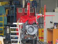 ZK-HDT @ NZAR - in heliflite hangar - by magnaman
