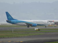 VH-XNU @ NZAA - just landed at AKL - by magnaman