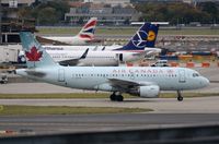 C-GITR @ EGLL - Air Canada A319 taxying out for departure in LHR. - by FerryPNL