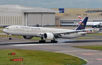 HZ-AK37 @ EGLL - Saudi B773 burning some rubber in LHR - by FerryPNL