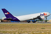 N655FE @ KBOI - Departing RWY 28R. - by Gerald Howard