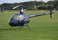 G-BMIZ @ EGLD - Robinson R22 Beta at Denham. Ex OO-VCE - by moxy