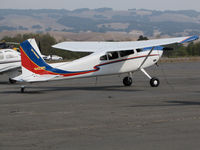 N422RT @ O69 - Colorful Montana based 1977 Cessna 180K @ Petaluma Municipal Airport, CA