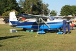 N2435G @ OSH - 1959 Cessna 182B, c/n: 51735 - by Timothy Aanerud
