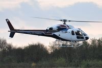 G-CMRA @ EGFH - Visiting Ecuereuil II departing the airport. - by Roger Winser