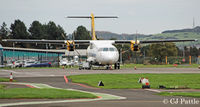 G-HUET @ EGPN - Pictured on the ramp at Dundee a few days after starting its lease to Loganair to operate the twice daily Dundee to Stansted flights. - by Clive Pattle