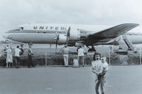 N37573 @ HNL - This was taken around 1960 in Hawaii. My mother is holding me in the foreground. - by Edmond Muller