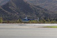 N454WT @ SZP - 2001 Robinson 44 RAVEN, Lycoming O-540-F1B5 derated to 205 Hp continuous, liftoff from SZP Helipad - by Doug Robertson