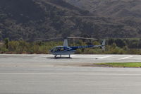 N454WT @ SZP - 2001 Robinson R44 RAVEN, Lycoming O-540-F2B5 derated to 205 Hp continuous, parked on SZP Helipad. - by Doug Robertson