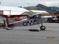 ZK-DMN @ NZAR - out in spring sun - by magnaman