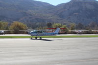 N704JH @ SZP - 1976 Cessna 150M, Continental O-200 100 Hp, landing roll Rwy 04 - by Doug Robertson