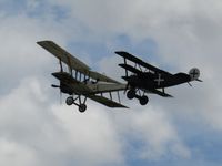 ZK-VCM @ NZAR - being chased by fokker dr1 replica - by magnaman