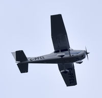 G-PFCL - Flying over Woking - by David Holmes