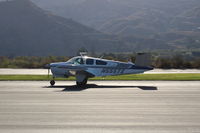 N555TX @ SZP - 1976 Beech  V35B BONANZA, Continental IO-520 285 Hp, landing roll Rwy 04 - by Doug Robertson