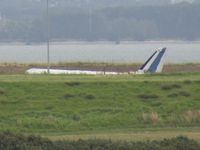 VH-FLO @ NZAA - still alive on fire dump - as seen from public viewing car park (upper level) puhinui road - by magnaman