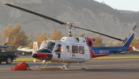 N212AH @ SZP - 1979 Bell 212 TWIN-TWO-TWELVE P&W(C)PT6T-3 Twin-Pac coupled free turbine Turboshaft 1,800 Hp, with fire retardant bucket on sling - by Doug Robertson