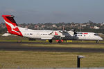 VH-QON @ YSSY - TAXIING - by Bill Mallinson