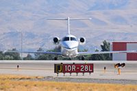 N264DL @ KBOI - Holding on Juliet for RWY 10R. - by Gerald Howard
