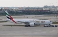 A6-EWE @ KFLL - Boeing 777-200ER - by Mark Pasqualino