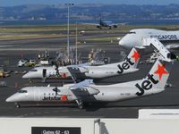 VH-TQD @ NZAA - double trouble - by magnaman