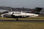 VH-MHV @ YSSY - TAXIING - by Bill Mallinson