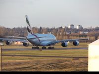A6-EUZ @ EGBB - Taxiing down runway 33 at Birmingham Airport.
